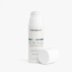 Theobion Peptide Depuff Eye Gel-Cream in a white pump bottle with its cap resting beside it on a clean white background.