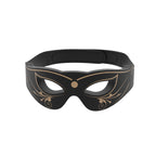 Black mask with gold accents on a white background