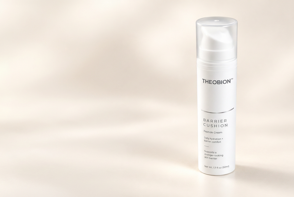 Theobion Barrier Cushion Peptide Cream on stone with cranberries and aloe
